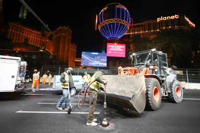 Workers try to fox the drain covers in Las Vegas