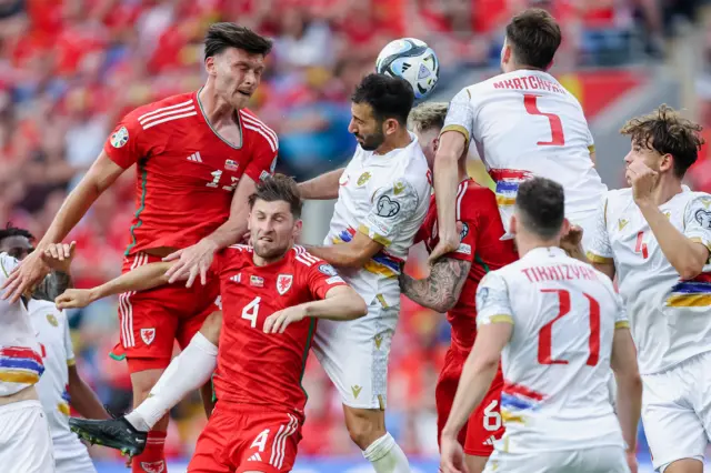 Kieffer Moore heading the ball v Armenia in reverse fixture