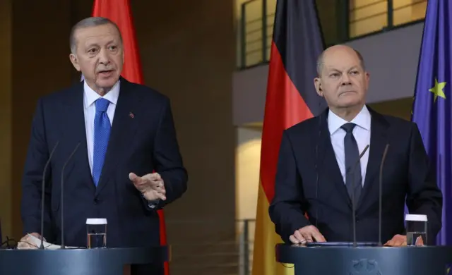 Turkish President Recep Tayyip Erdogan speaks during a press conference with German Chancellor Olaf Scholz