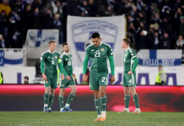 Dejected Northern Ireland players