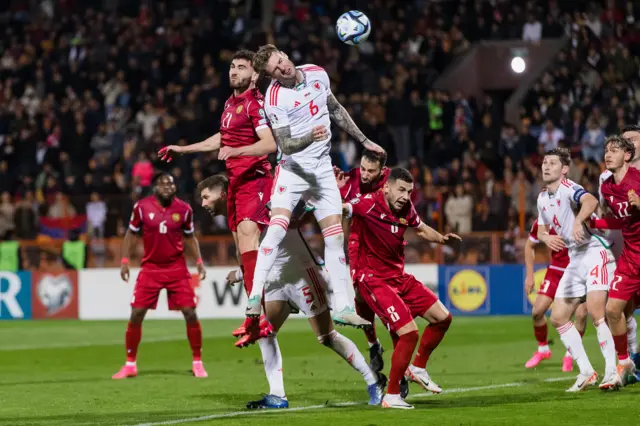 Joe Rodon challenges as Nair Tyknizyan heads into his own net