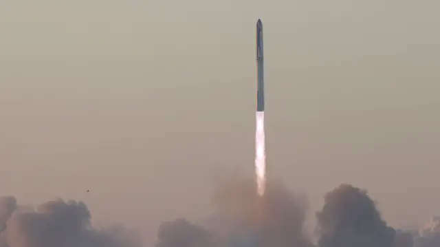 Rocket takes off amid a huge cloud of smoke