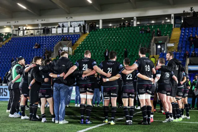 Glasgow Warriors players gathered in a huddle after their win over Benetton