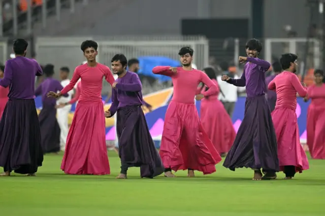 Performers take part in a rehearsal at the Narendra Modi Stadium in Ahmedabad on November 18, 2023, on the eve of the 2023 ICC Men's Cricket World Cup one-day international (ODI) final match between India and Australia.