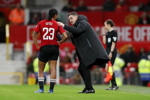 Marc Skinner speaks to Geyse on the pitch