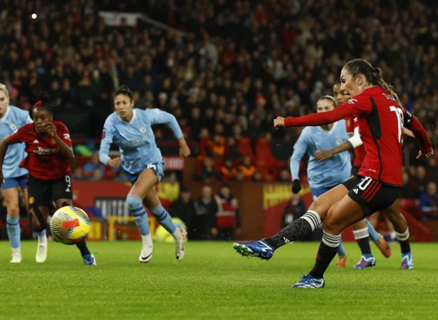 Katie Zelem takes a shot form the penalty spot