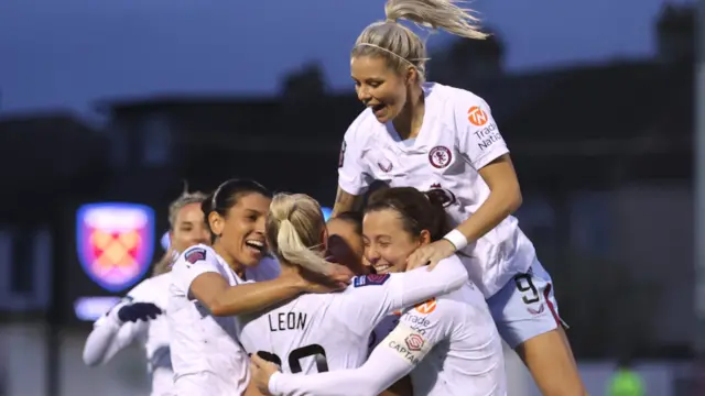 Aston Villa's players celebrate beating West Ham in the Women's Super League