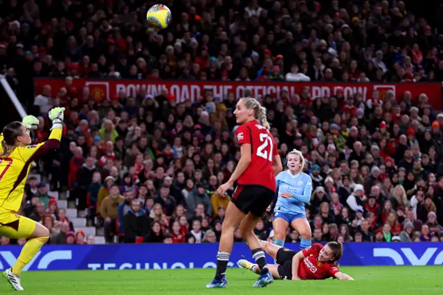 LAuren Hemp looks on as her shot goes past Mary Earps