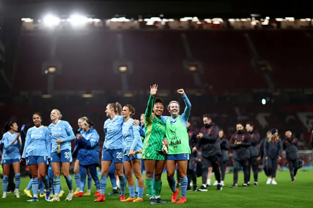 Khiara Keating and Lauren Hemp of Manchester City acknowledge the fans