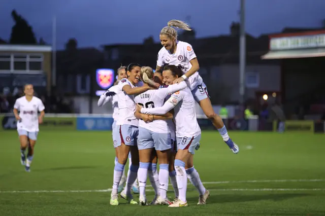 Aston Villa celebrates with team mates