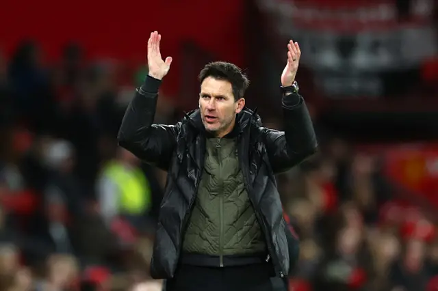 Gareth Taylor applauds the fans after the game