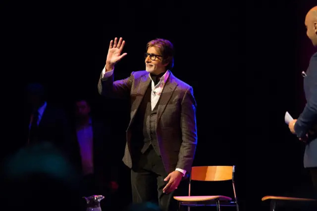 Bollywood star Amitabh Bachchan chats with Tommy Sandhu in front of a live audience for Asian Network's In Conversation at the Bloomsbury Theatre in London.