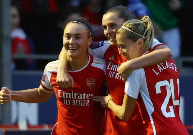 Caitlin Foord celebrates scoring their second goal with teammates Noelle Maritz and Cloe Lacass