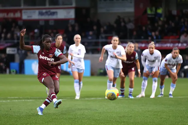 Viviane Asseyi of West Ham scores her sides first goal from the penalty spot