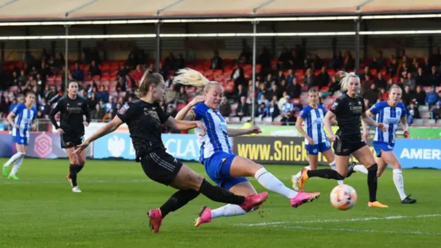 Arsenal football player Victoria Pelova scores against Brighton in the WSL