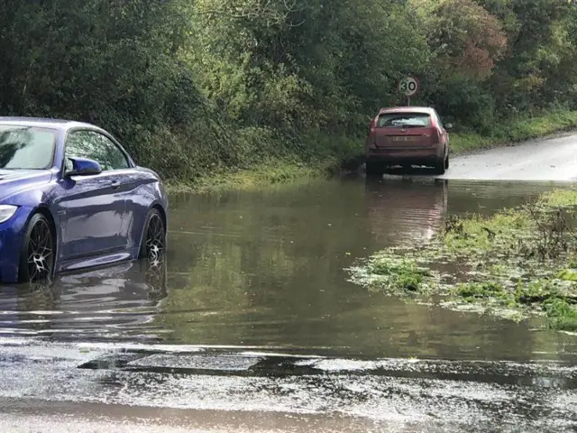 A flooded road just off the A140 at Thwaite.