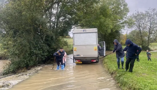 Van stuck in flooded road at Flowton, ipswich