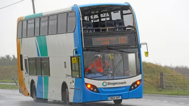 Bus with shattered window