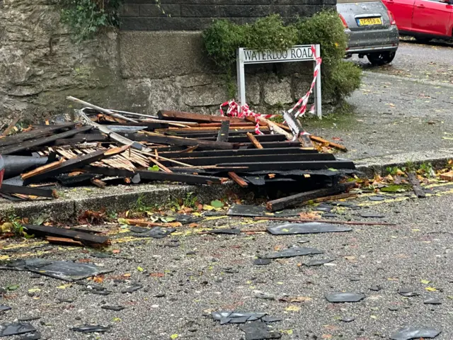 Roof debris on road