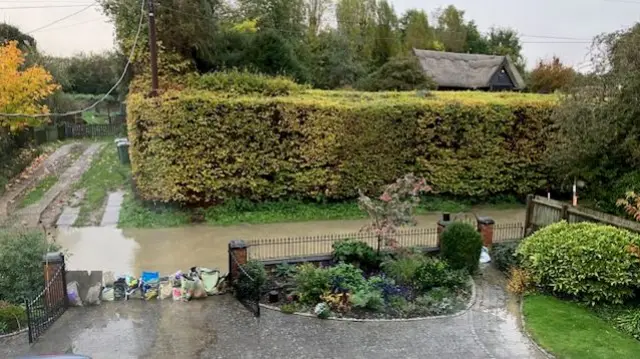 bags of compost and leaf mould to hold back flood waters