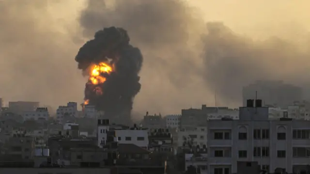 Smoke and flames rise following an Israeli strike on the Tal Al Hawa neighborhood in Gaza City, 02 November 2023