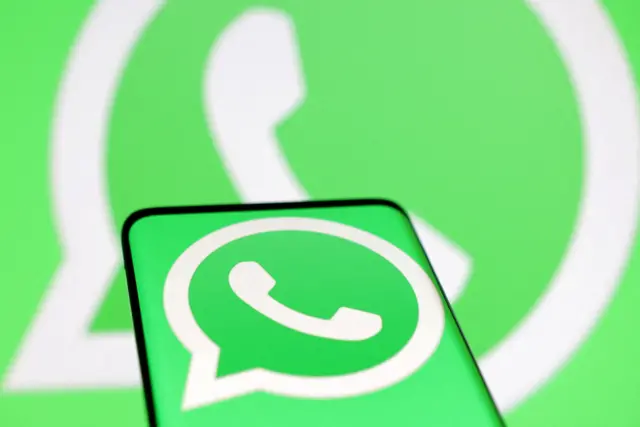 WhatsApp logo on a phone