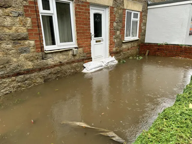 Sandbags against the door in Highworth