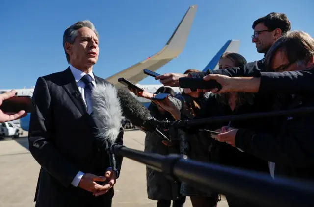 Antony Blinken on the tarmac ahead of his trip to Tel Aviv