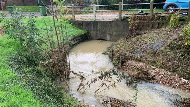 Water rushing through the culvert on Ferguson Way and Mill Lane in Attleborough Norfolk.