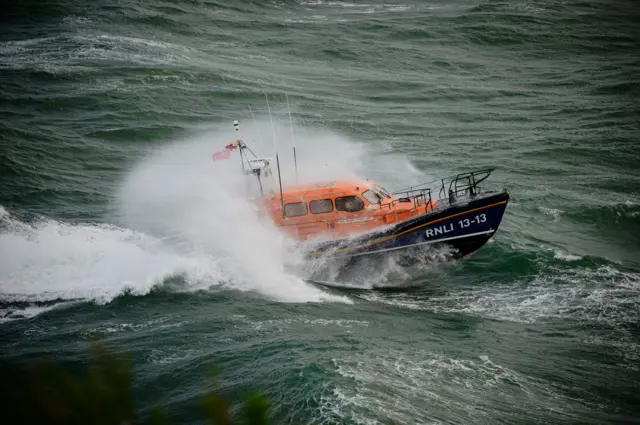 Swanage all-weather lifeboat on a call in rough conditions