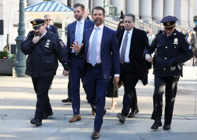 Trump sons walk into New York court