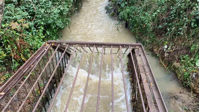 Water rushing through the culvert on Ferguson Way and Mill Lane in Attleborough Norfolk.