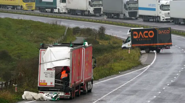 Two lorries on the A20 near Dover, Kent, as Storm Ciaran brings high winds and heavy rain along the south coast of England. The Environment Agency has issued 54 warnings where flooding is expected, and an amber weather warning is in place with winds expected to reach 70mph to 80mph.