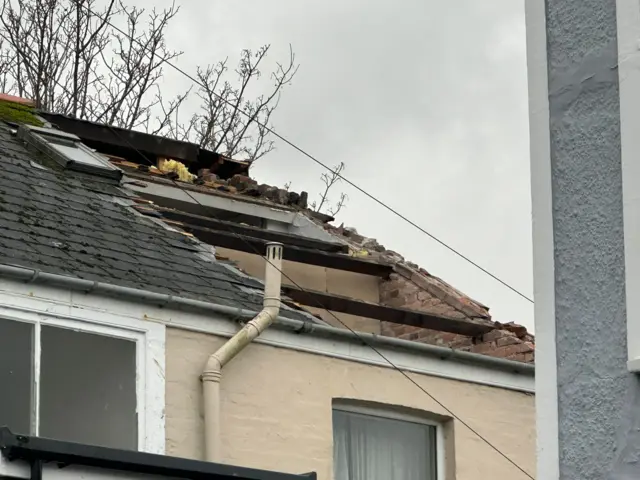 A large section of roof was blown off