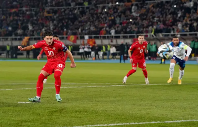 Bardhi shoots his penalty towards goal.