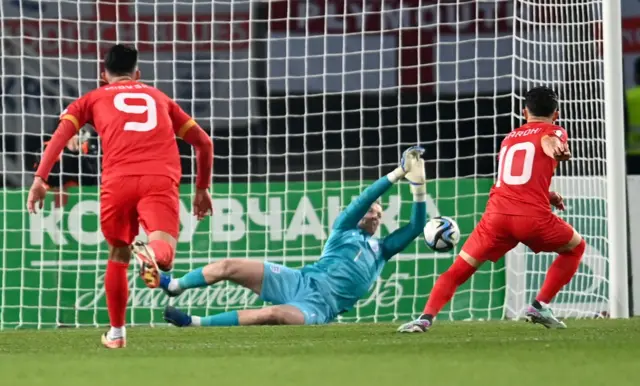 Pickford saves Bardhi's initial shot from the penalty spot.