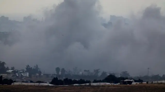 Smoke rising after an explosion in northern Gaza