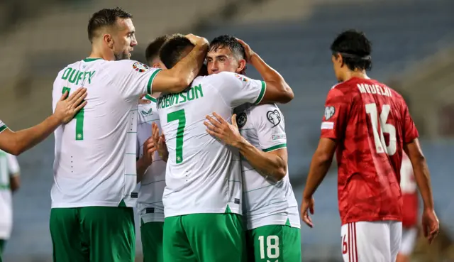 Mikey Johnston celebrates scoring against Gibraltar