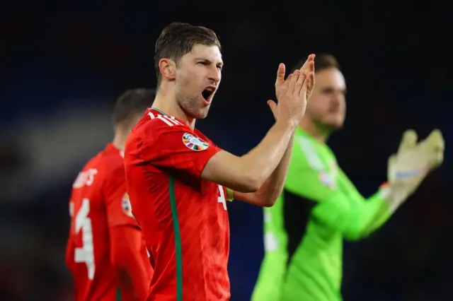 Ben Davies applauds Wales' fans