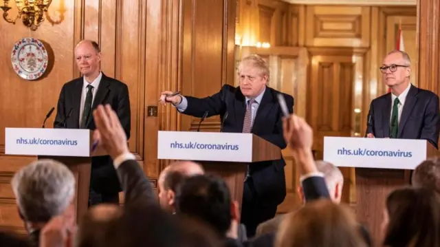 Chris Whitty, then-PM Boris Johnson and Chief scientific officer Sir Patrick Vallance at a Covid press briefing on 16 March 2020