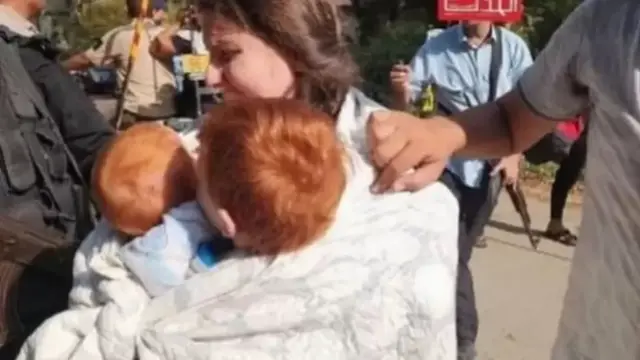 Shiri Bibas and her two young children being taken away by Hamas