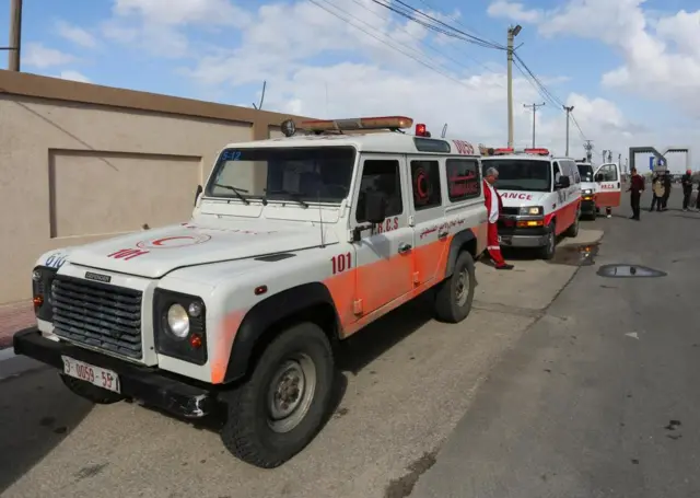 Red Crescent ambulances pictured on Monday, taking patients from al-Shifa across the border into Egypt