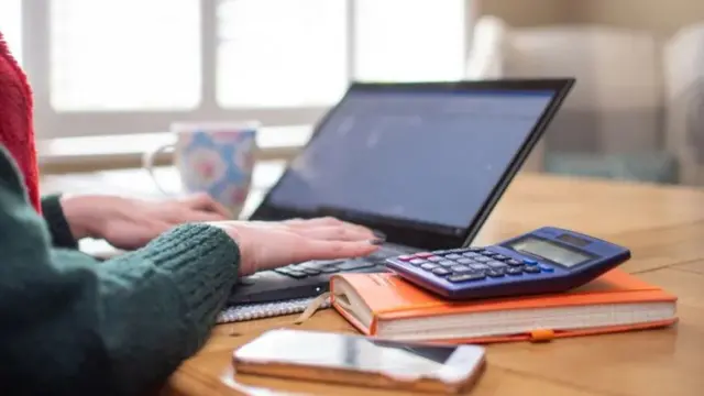 Person working at a laptop