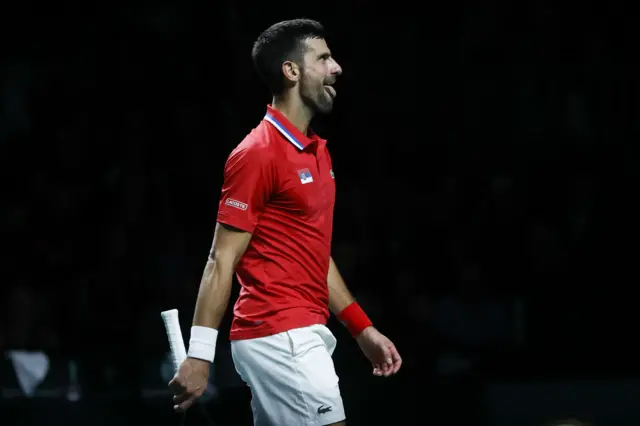 Novak Djokovic sticks his tongue out