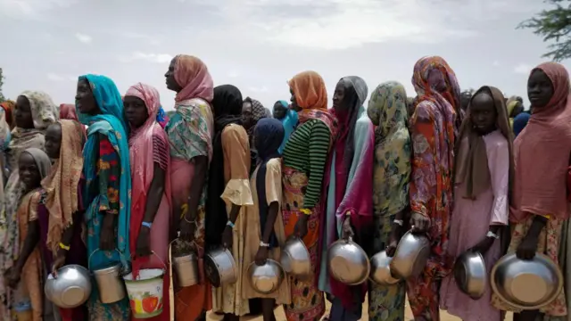 Women queuing up for food aid