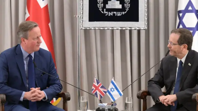 UK Foreign Secretary David Cameron speaks to Israeli President Isaac Herzog