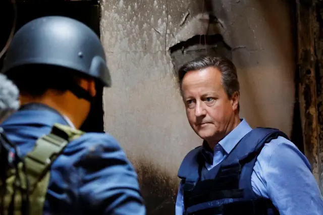 David Cameron inside building damaged in 7 October Hamas attack