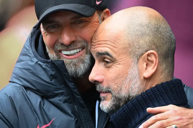 Jurgen Klopp hugging Pep Guardiola