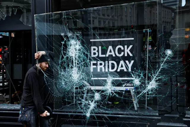 A smashed window in a  shop in Dublin