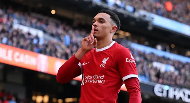 Trent Alexander-Arnold shushes the crowd